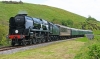 34053