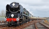 35028