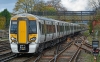 387101