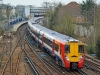 458027