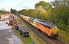 67023