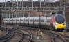 390107