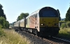 67027